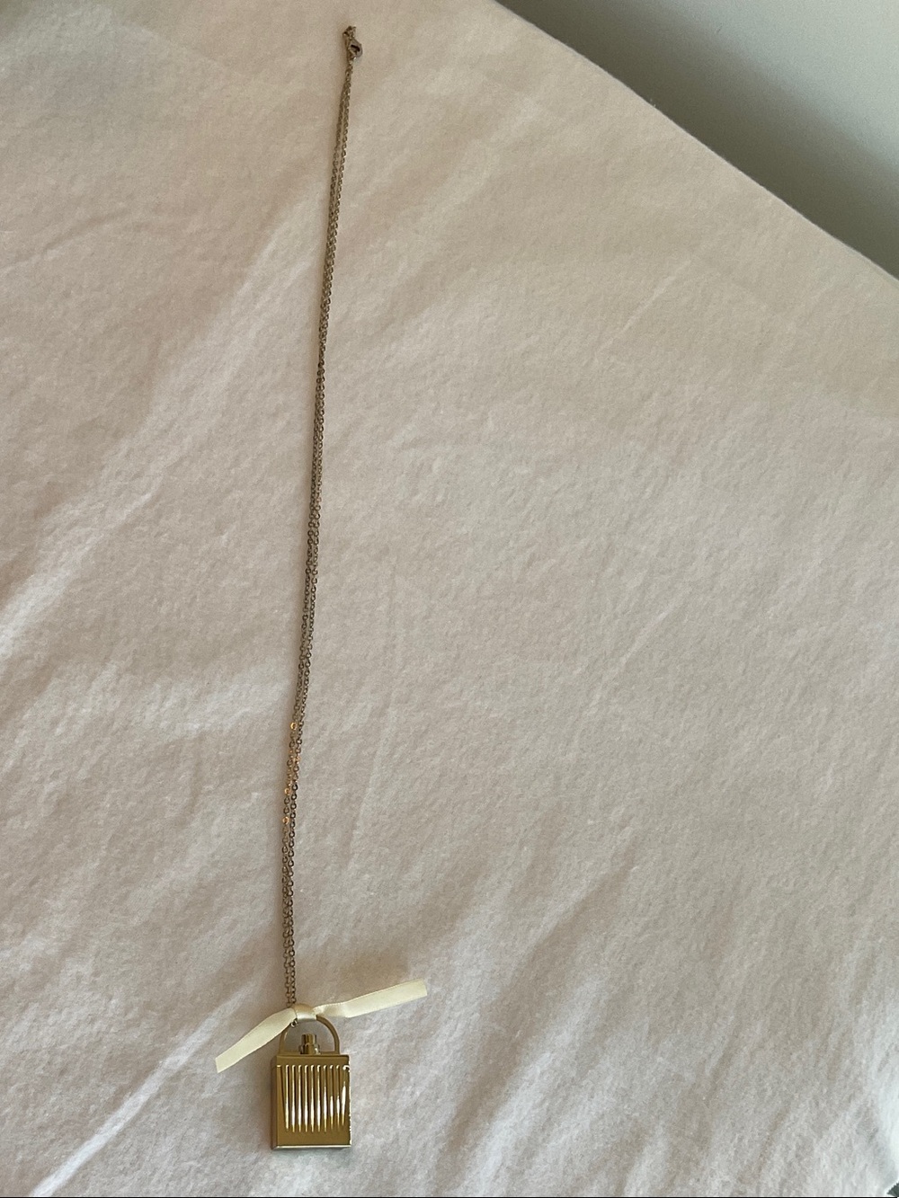 Chloe Gold Perfume Bottle Pendant Necklace with Ribbon Accent - Picture 4 of 5